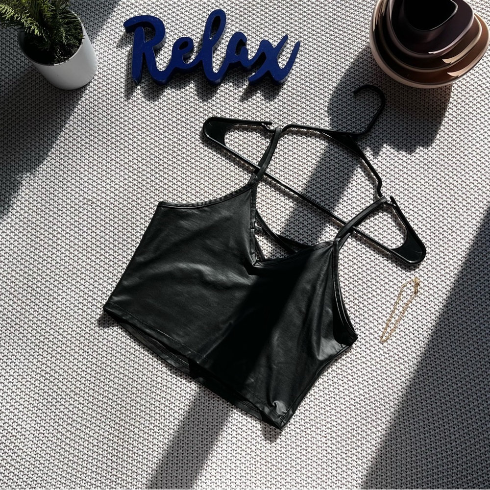 Faux leather cropped, crisscross, top.